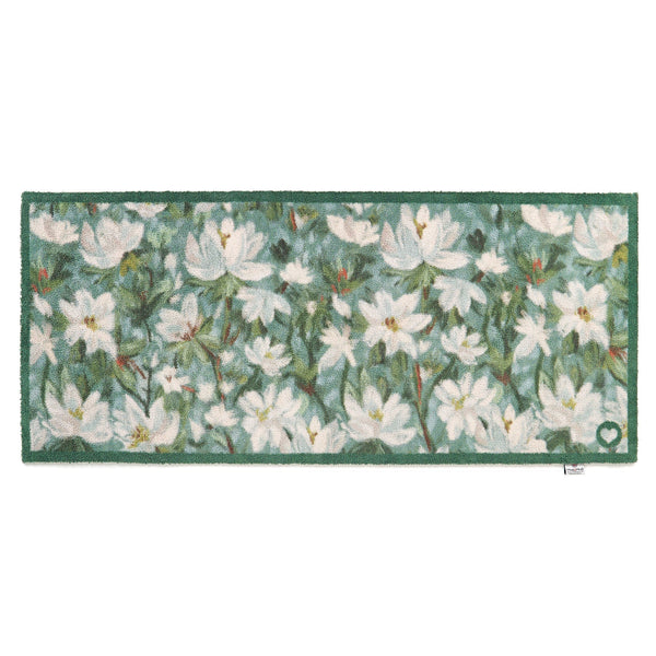 Water Lilies Washable Runner in Blue- a 100% recycled cotton runner featuring hand-painted white water lilies surrounded by green leaves.