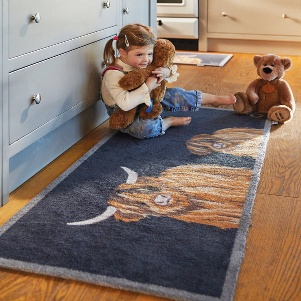 Highland Cow 1 Washable Runner in Blue- a 100% recycled cotton runner featuring a two hand-drawn brown Highland cows.