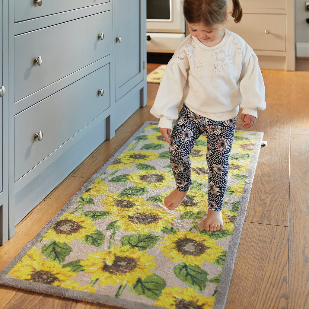 Sunflowers 1 Washable Runner in beige- a 100% recycled cotton runner featuring an array of vibrant yellow sunflowers.