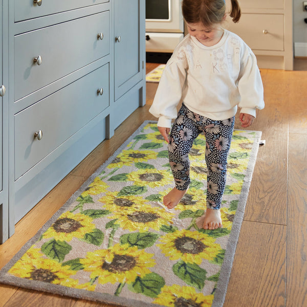 Sunflowers 1 Washable Runner in beige- a 100% recycled cotton runner featuring an array of vibrant yellow sunflowers.