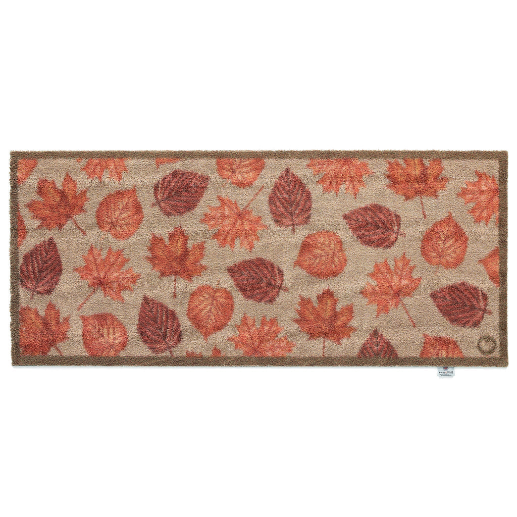 Autumn Leaves Washable Runner in Beige- a 100% recycled cotton runner featuring hand-painted leaves in various shades of orange, red, and brown.