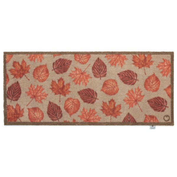 Autumn Leaves Washable Runner in Beige- a 100% recycled cotton runner featuring hand-painted leaves in various shades of orange, red, and brown.