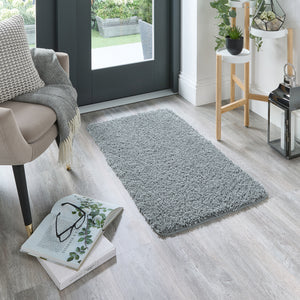 My Blue Fleck Rug – a washable rug in lighter and darker shades of silvery blue.