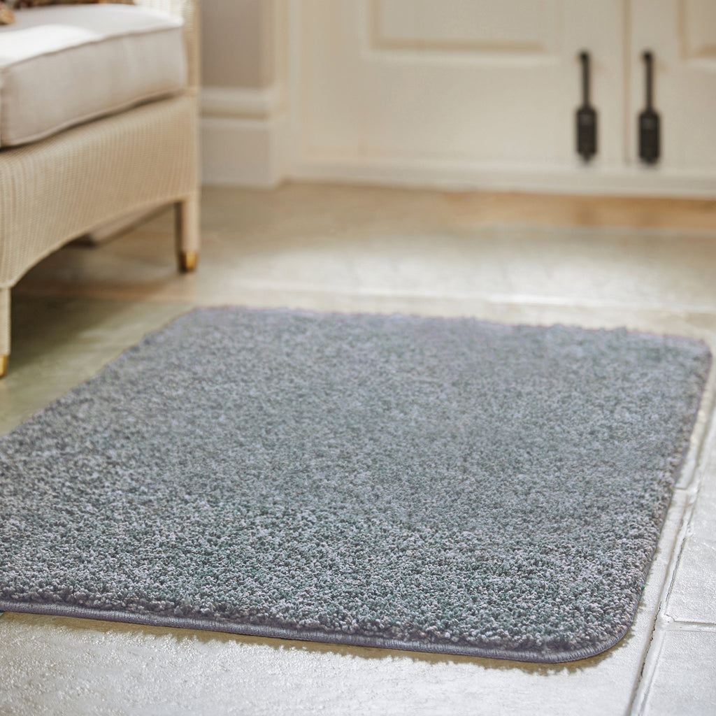 My Blue Fleck Rug – a washable rug in lighter and darker shades of silvery blue.