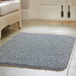 My Blue Fleck Rug – a washable rug in lighter and darker shades of silvery blue.