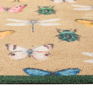 Bugs & Butterflies Beige Washable Runner in Beige- a 100% recycled cotton runner featuring a horizontal row of insects including butterflies, dragonflies, ladybugs, and beetles, in shades of blue, red, green, yellow, and white.