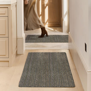 Candy Sage Green Washable Runner- a 100% recycled material runner featuring a subtle striped pattern in shades of grey, beige, and medium green.