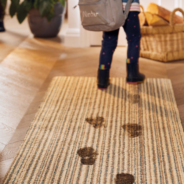 Candy Earth Stripe Washable Runner- a 100% recycled material runner in shades of blue, beige, brown, and light grey.