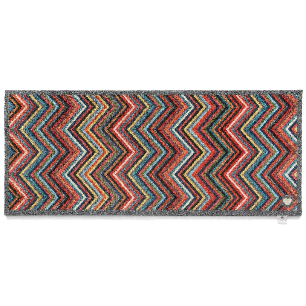Chevron 1 Multicoloured Runner- a 100% recycled cotton runner featuring multicoloured chevrons arranged horizontally.