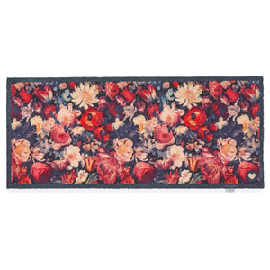 Dark Florals Washable Runner- a 100% recycled cotton runner featuring oversized floral blooms in shades of red, cream, orange, and pink against a navy backdrop.