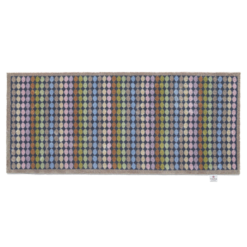 Designer 22 Washable Runner- a 100% cotton runner featuring vertical rows of rainbow-coloured spots.