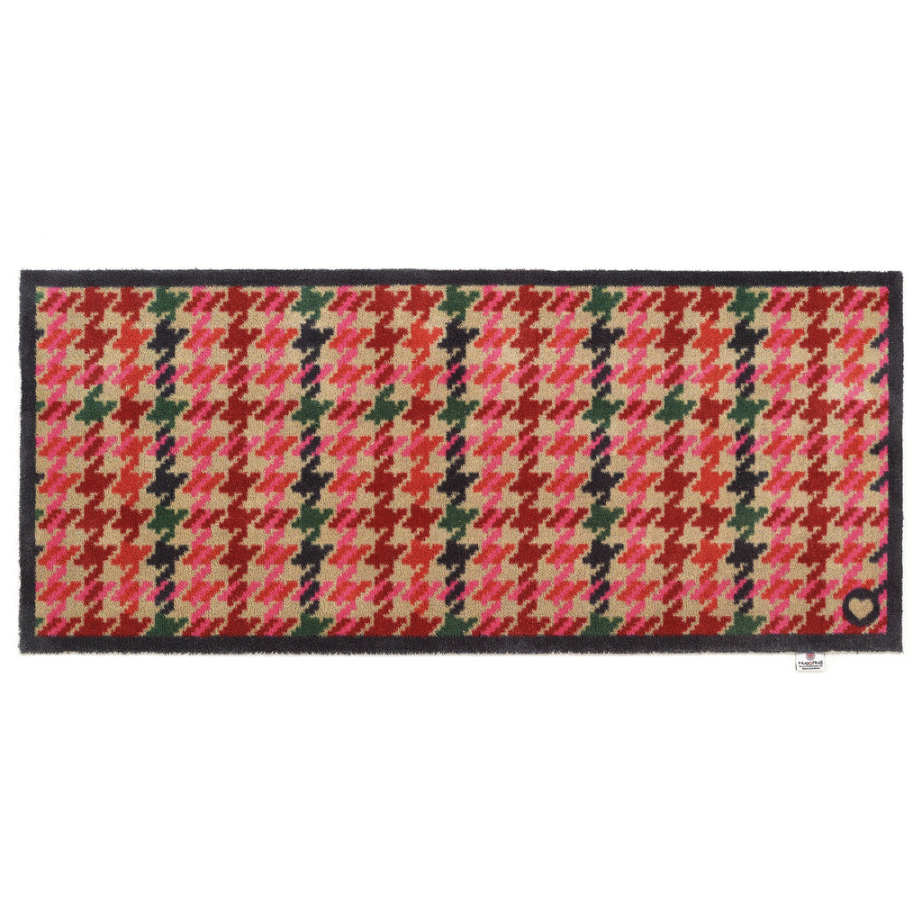 Designer 27 Washable Runner- a 100% cotton runner featuring a vertical houndstooth pattern in shades of pink, red, green, and dark navy