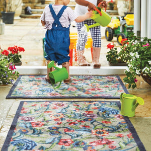 Garden Multi Floral 2 Runner in beige- a 100% recycled cotton runner featuring a mix of blue and red intertwined flowers with green leaves.