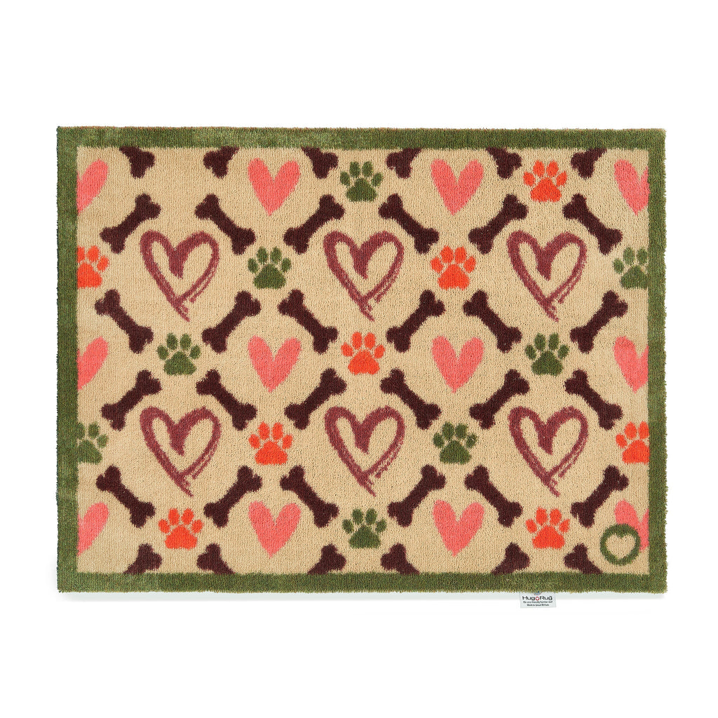 Overhead of Hug Rug beige hearts and bones washable doormat