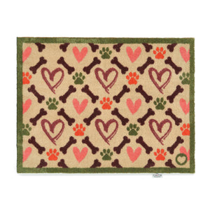 Overhead of Hug Rug beige hearts and bones washable doormat