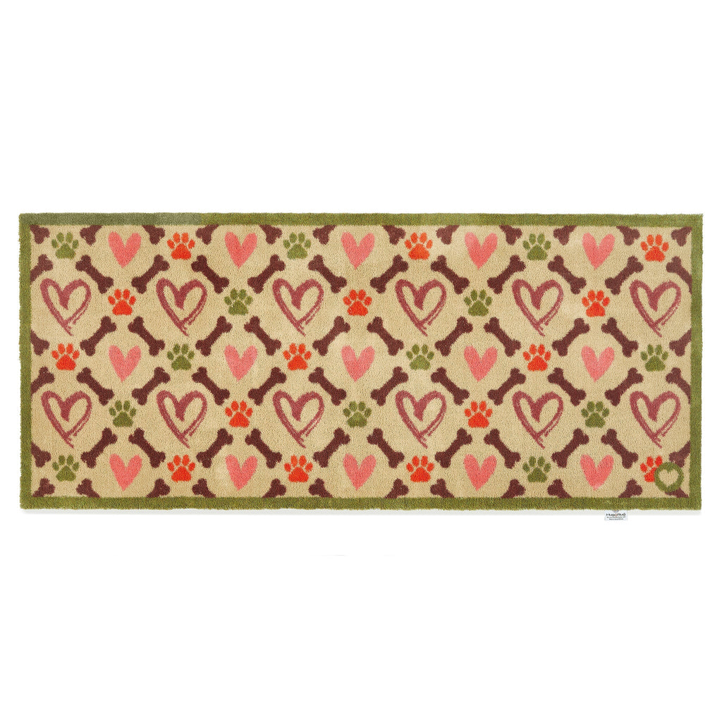 Hearts & Bones Runner - a 100% cotton runner featuring a pattern of bones, paw prints, and hearts in shades of burgundy, pink, green, and red.