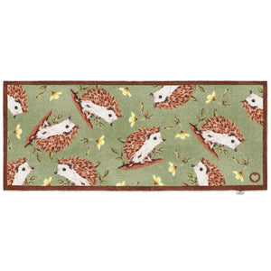 Hedgehog Friends Washable Runner in Sage Green- a 100% recycled cotton runner featuring hand-painted hedgehogs with yellow flowers.