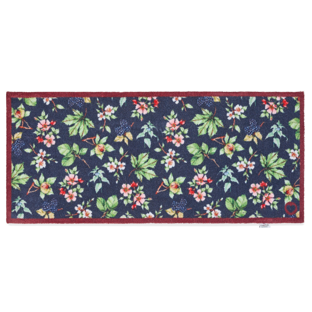 Hedgerow & Berries Washable Runner- 100% recycled cotton runner featuring dog rose, hazel and blackberries against a dark blue background.