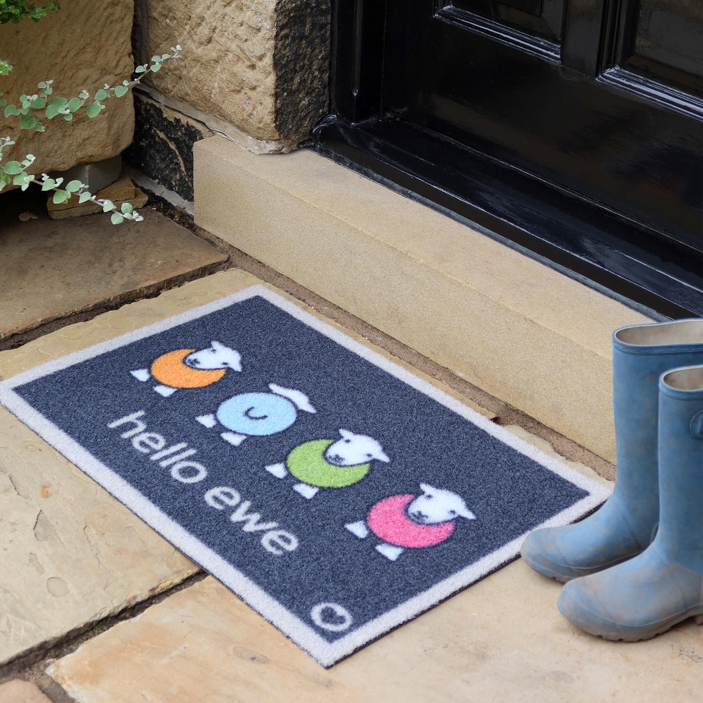 Hello Ewe Outdoor Doormat- 100% recycled nylon blue outdoor doormat featuring four colourful Highland cows.