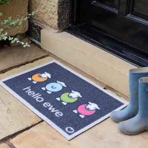 Hello Ewe Outdoor Doormat- 100% recycled nylon blue outdoor doormat featuring four colourful Highland cows.