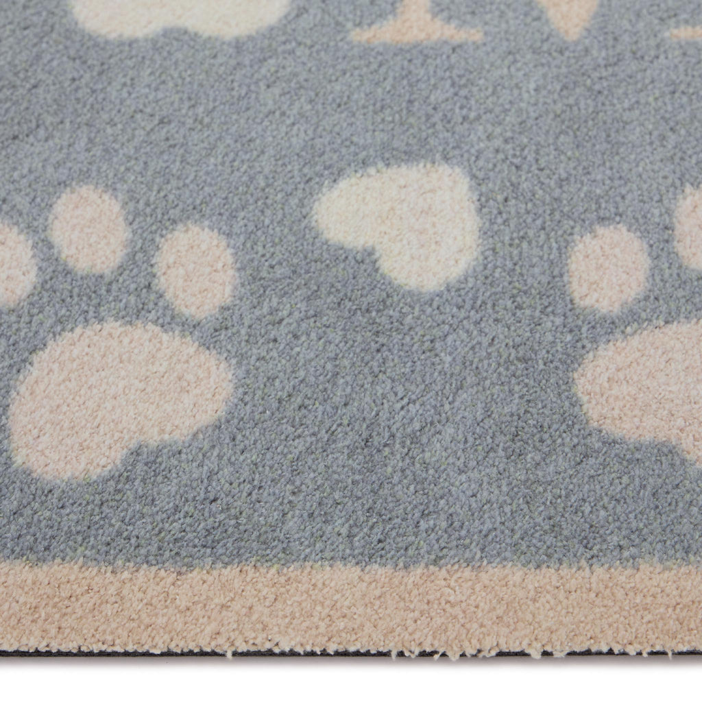 Home Paws Blue Washable Runner in blue- a 100% recycled cotton runner featuring paw prints and a love heart border along the long side of the runner.