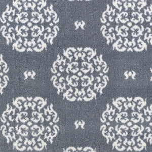 Home 44 Washable Runner in Grey- a 100% recycled cotton runner featuring a horizontal array of white floral patterns.