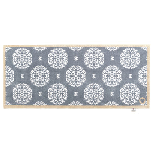 Home 44 Washable Runner in Grey- a 100% recycled cotton runner featuring a horizontal array of white floral patterns.