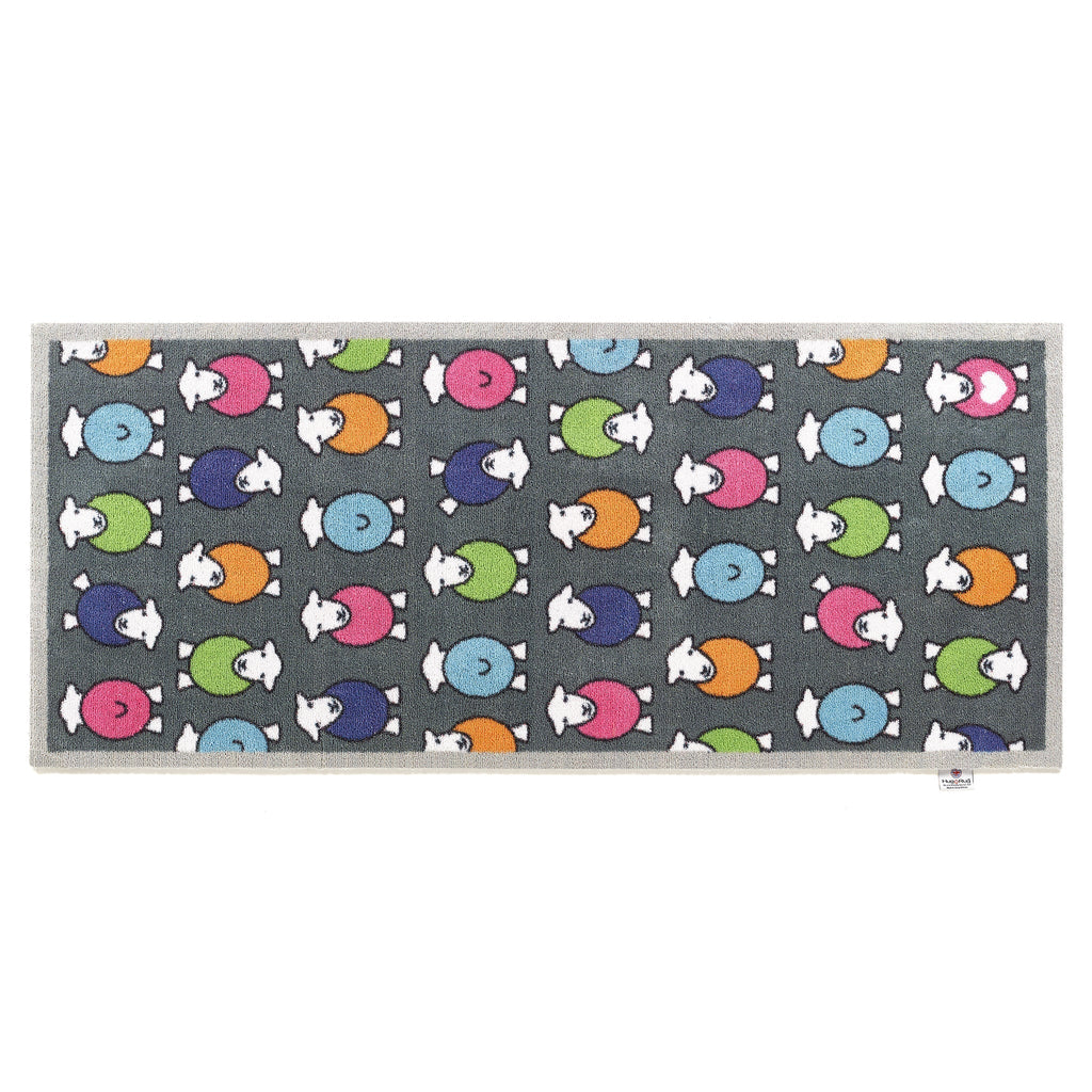 Discover the Marra Grey Herdy Washable Runner- a 100% recycled cotton runner featuring an all-over colourful print of Herdy's in pink, green, orange, blue, and purple. Soft, durable, and perfect for hallways, kitchens, entryways and in front of patio doors.