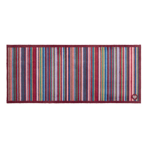Multi Stripe Red Washable Runner- a 100% recycled cotton runner featuring vibrant stripes in pink, light blue, dark blue, grey, orange, and dark brown.