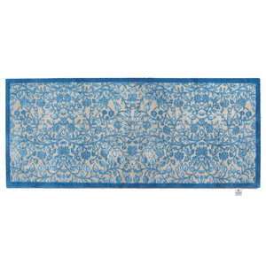Nature 33 Washable Runner in Beige- a 100% recycled cotton runner featuring intertwining floral pattern in various shades of blue.