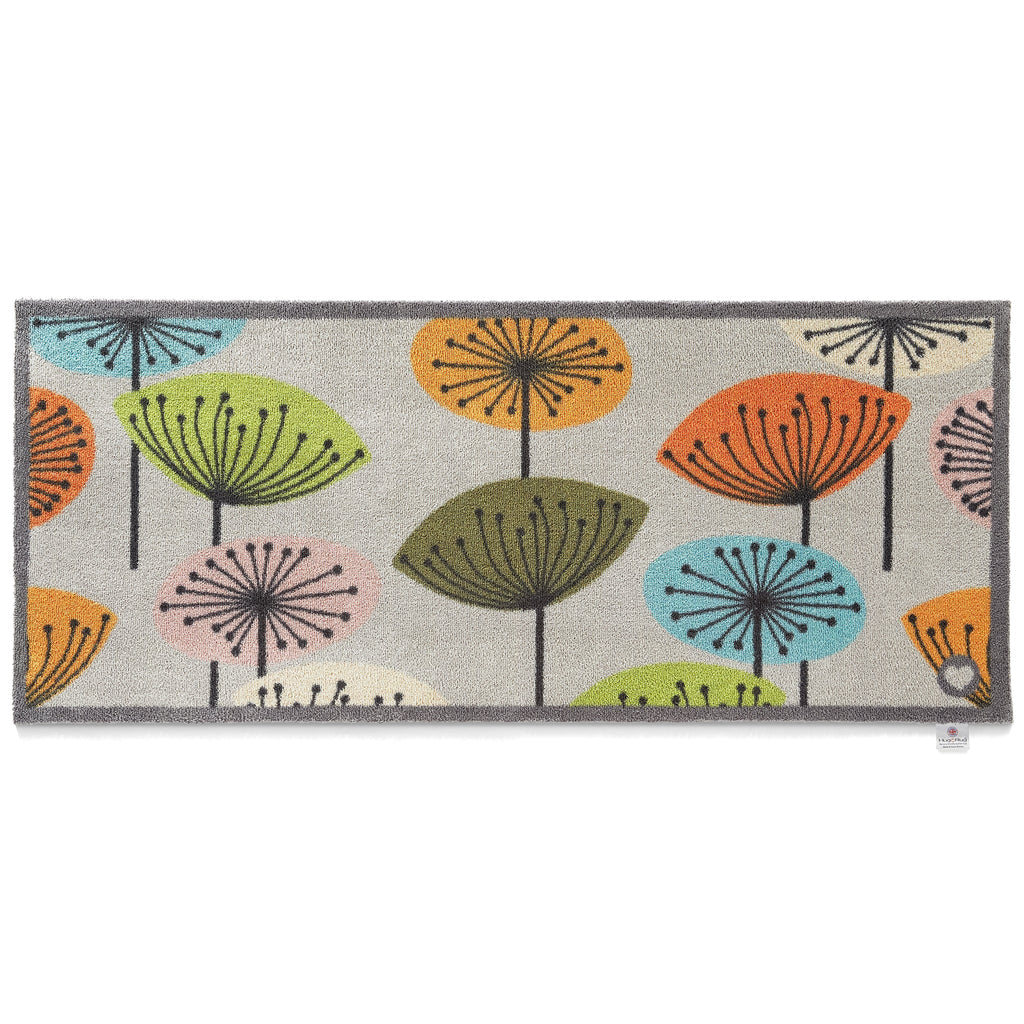 Nature 40 Washable Runner in Grey- a 100% recycled cotton runner featuring dandelions in blue, orange, green, khaki, pink, and cream.
