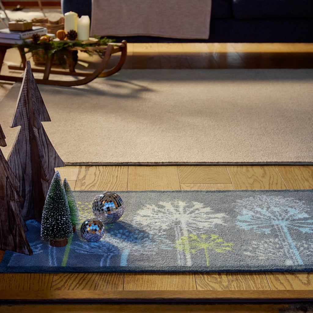 Nature 17 Dandelions Grey Runner- a 100% recycled cotton runner featuring a horizontal row of dandelions in various sizes, in lime green, yellow, white, and light blue.