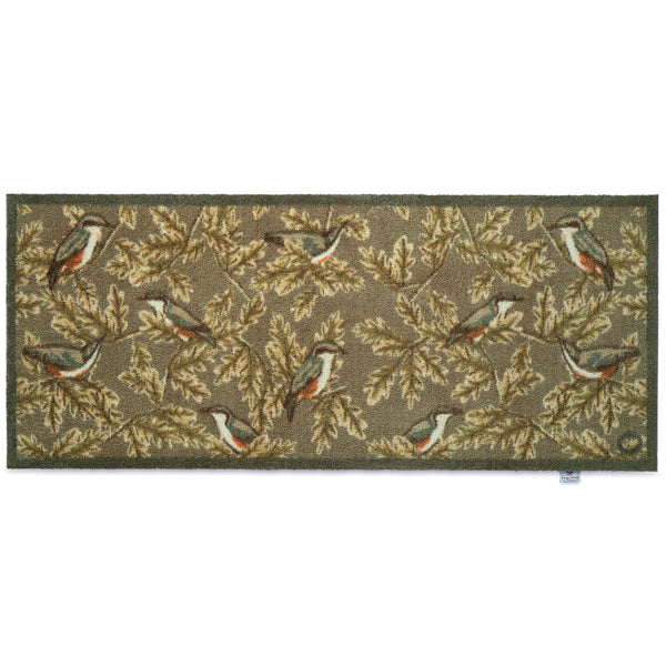 Nuthatch 1 Charity Runner in green- a 100% recycled cotton runner featuring various nuthatch birds perched among green leaves.