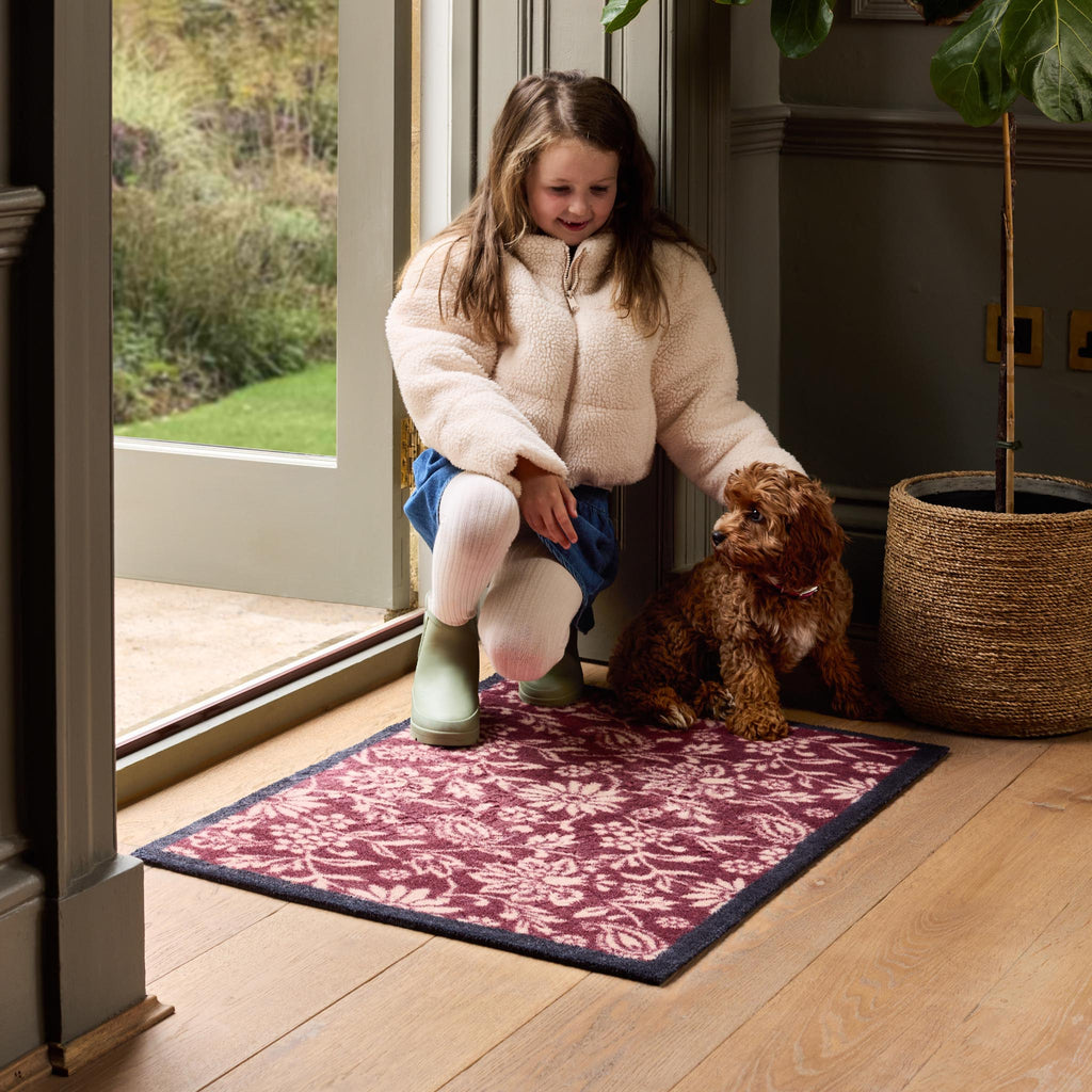 Paisley Floral Burgundy Washable Runner in a dark red- a 100% recycled cotton runner featuring a crisp white floral pattern.
