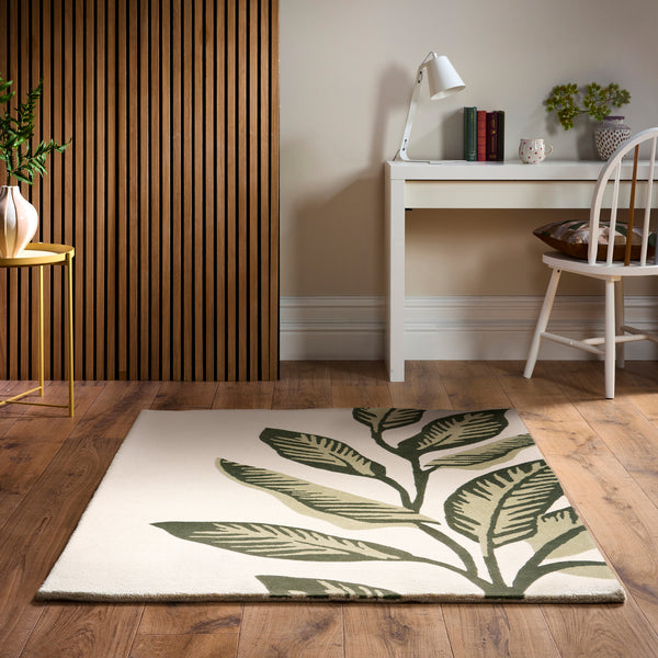 Discover the Paradise Leaf Rug- 100% wool cut pile rug in cream with a leaf design.