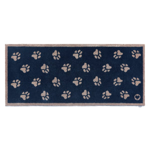Pet 10 Navy Washable Runner in Blue- a 100% recycled cotton runner featuring beige paw prints in a multi-directional pattern.