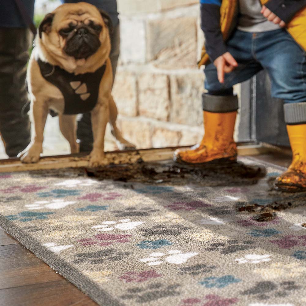 Pet 45 Paws Heart Washable Runner- a 100% recycled cotton runner featuring multi-coloured paw prints in a multi-directional pattern.