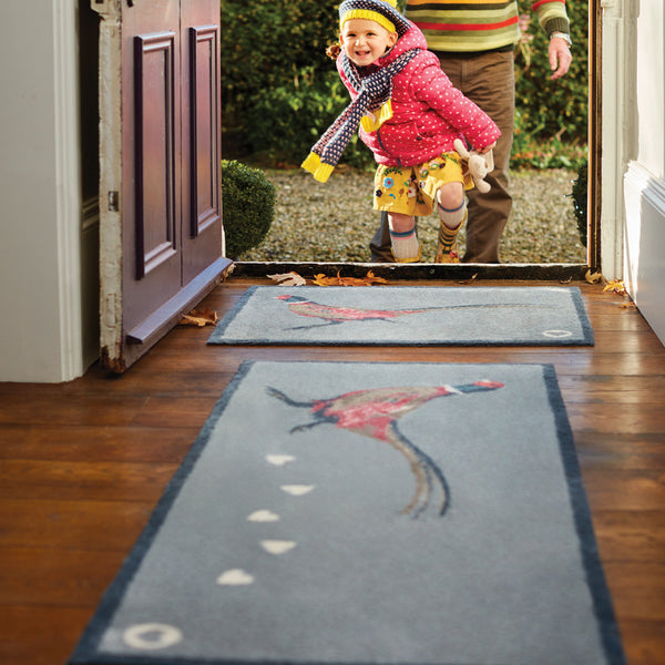 Pheasant 1 Grey Washable Runner in Grey- a 100% recycled cotton runner featuring a pheasant being trailed by white hearts.
