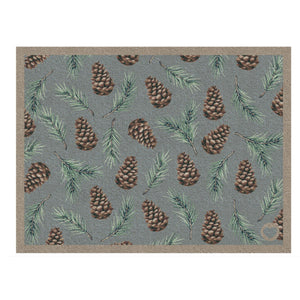 Pinecones Washable Doormat- a cotton doormat featuring scattered brown pinecones and green fern leaves.
