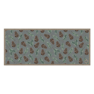 Pinecones Washable runner- 100% recycled cotton runner featuring scattered brown pinecones and green fern leaves.