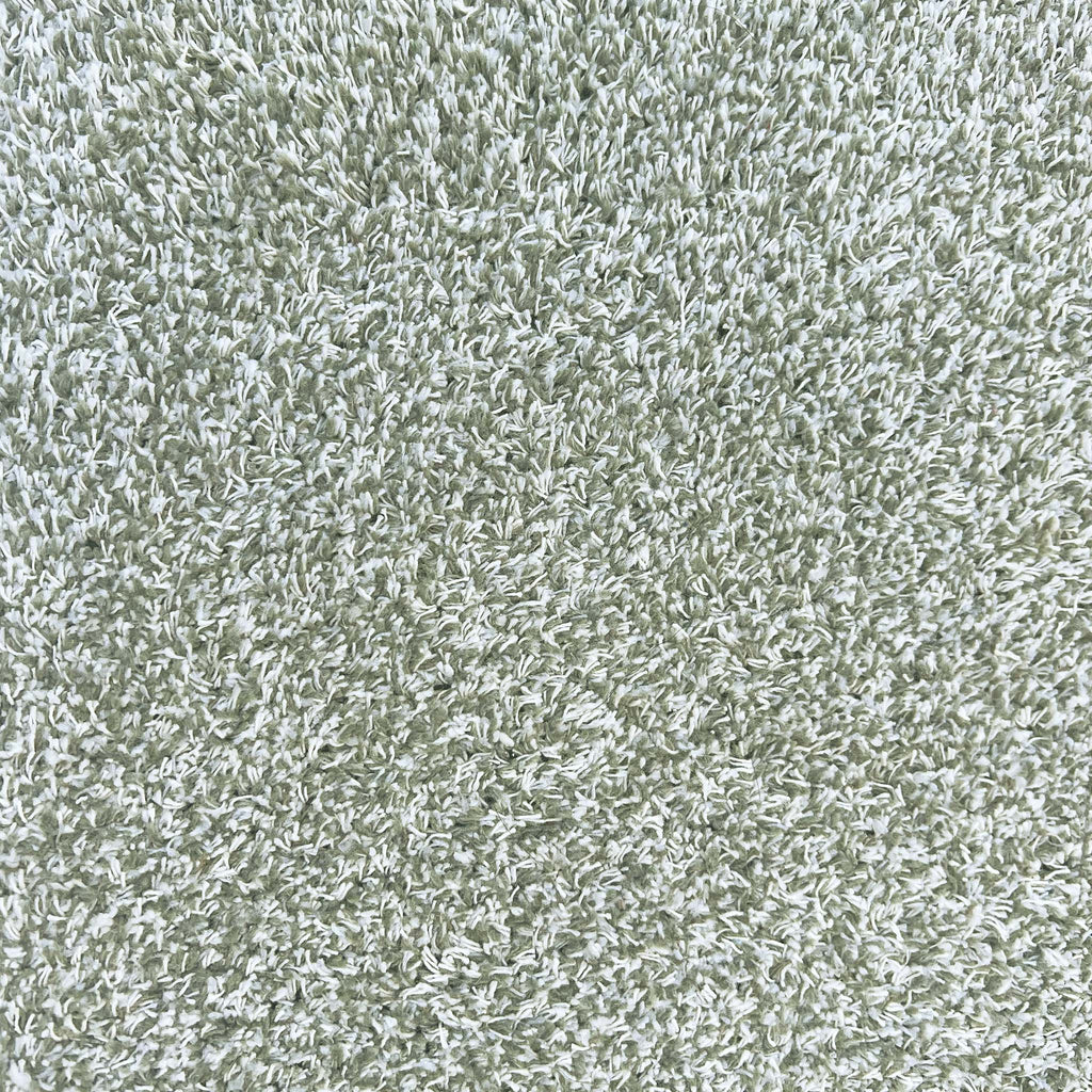 Plain Fleck Soft Green Runner- a 100% recycled material runner in shades of muted green and white.