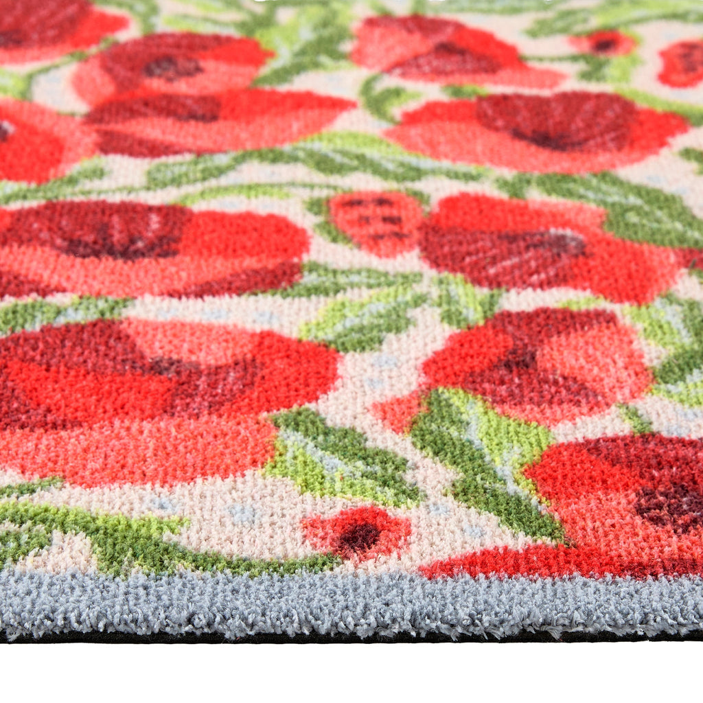 Poppies Galore Washable Runner- a 100% recycled cotton runner featuring bold red poppies with green stems and leaves.