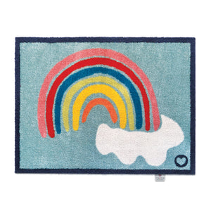 Rainbow 2 Charity Doormat- a 100% cotton doormat in sky blue featuring a rainbow and clouds design.