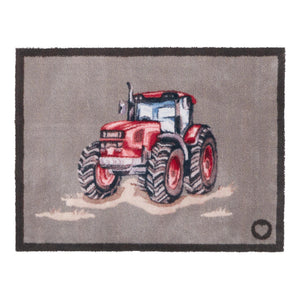 Red Farmyard Tractor Washable Doormat- a cotton washable doormat featuring a red tractor splashing through mud.