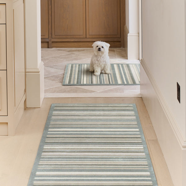 Sage Stripe Washable Runner- a 100% recycled cotton runner featuring a muted striped design.