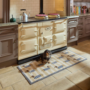 Sausage Dog Chic Washable Runner- 100% recycled cotton runner featuring sausage dogs in jumpers against a beige and cream striped background.