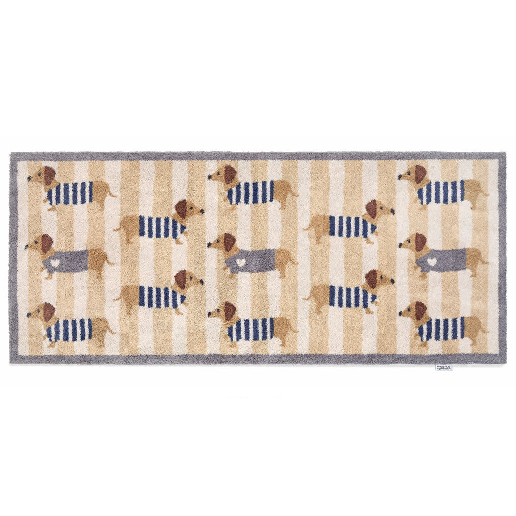 Sausage Dog Chic Washable Runner- 100% recycled cotton runner featuring sausage dogs in jumpers against a beige and cream striped background.