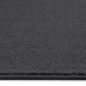 Sense Charcoal Washable Rug Runner- a 100% recycled polyester rug runner in a dark grey.