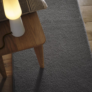 Sense Charcoal Washable Rug Runner- a 100% recycled polyester rug runner in a dark grey.