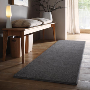 Sense Charcoal Washable Rug Runner- a 100% recycled polyester rug runner in a dark grey.